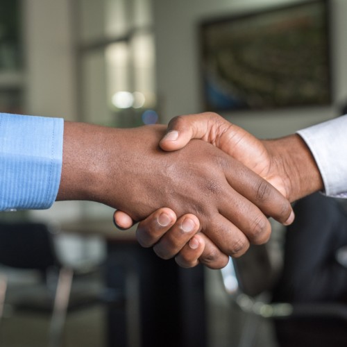 Shaking hands after a successful job interview