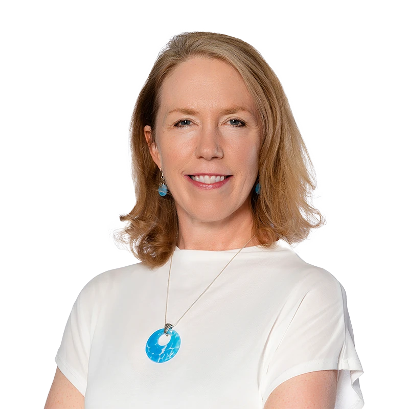 Susan Mullin headshot in white shirt