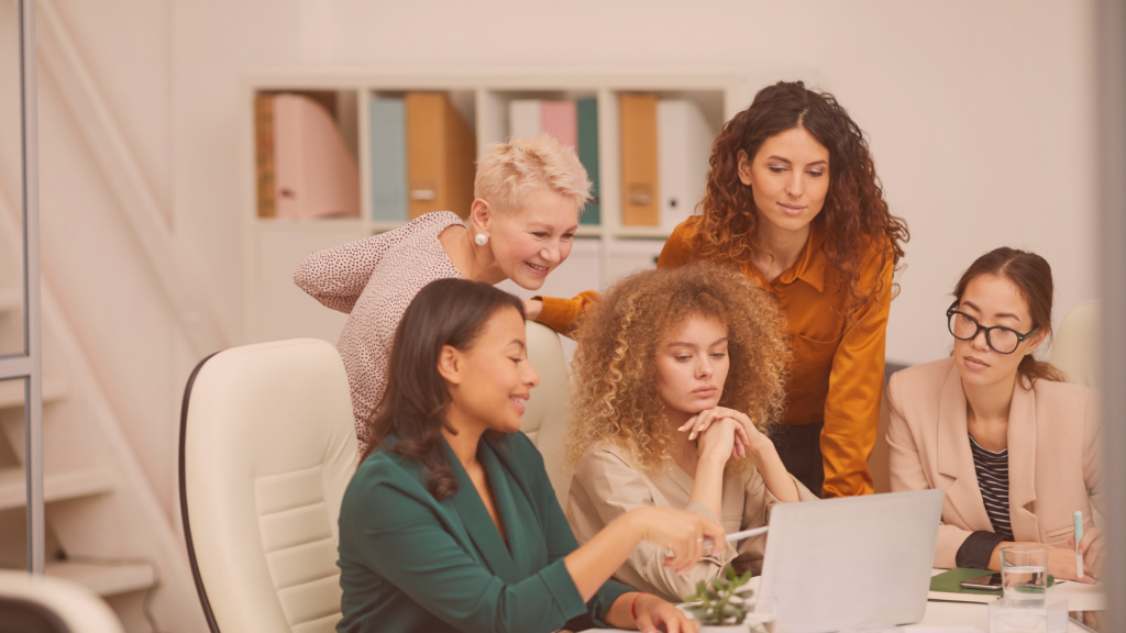 group of women working in an office despite gender discrimination