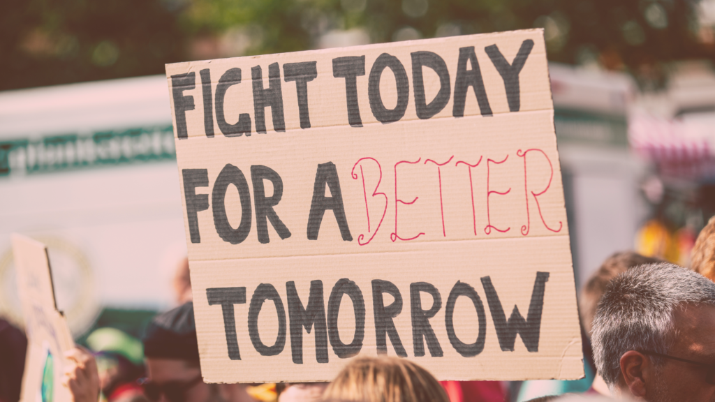 "fight today for a better tomorrow" protest sign fighting political discrimination