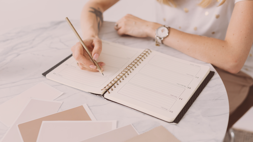 content marketing using a planner and pencil to plan out their content strategy