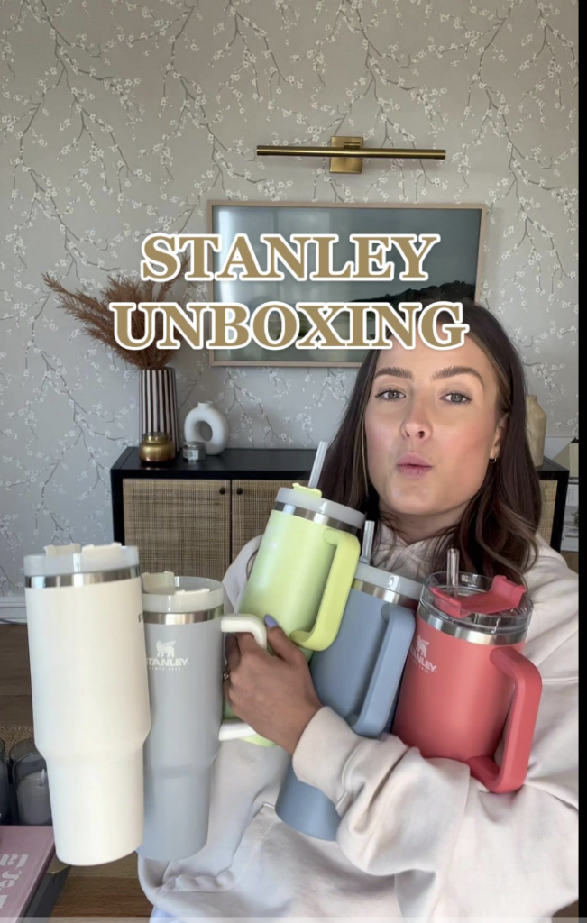 screenshot of tiktok creator doing a stanley cup unboxing